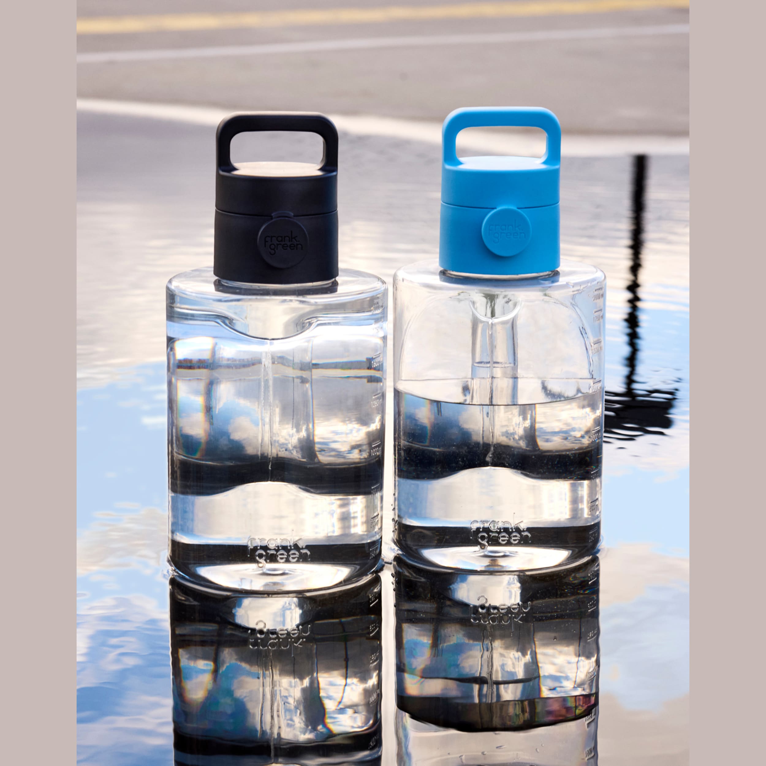 frank green 68oz Titan Reusable Bottle Clear with Grip & Sip Lid - Sky Blue