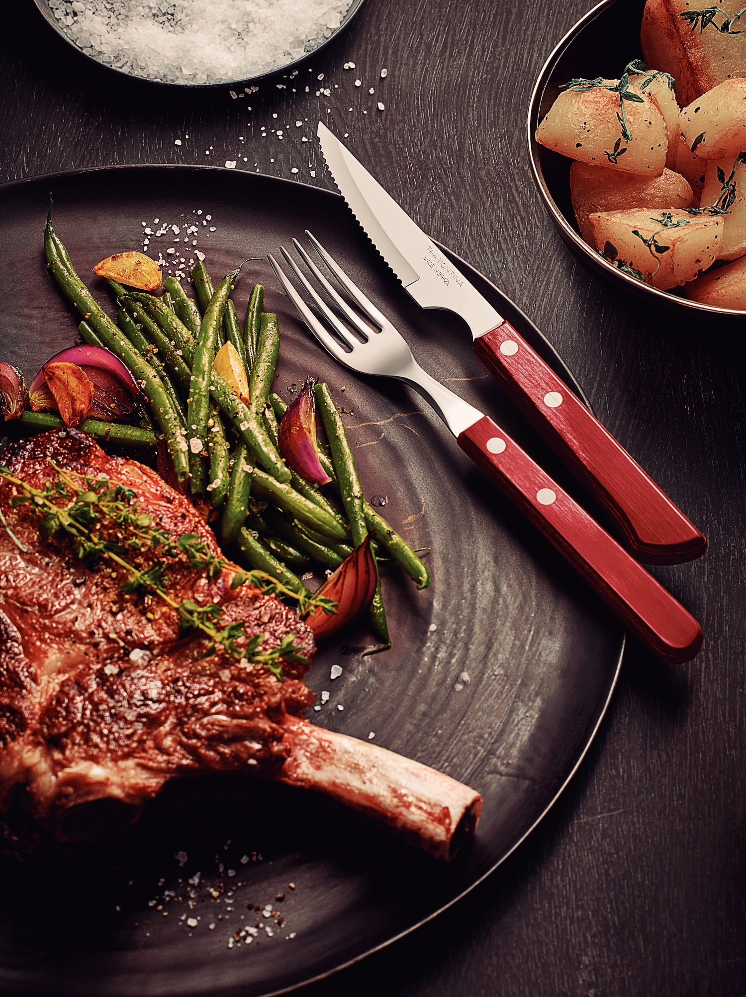 Tramontina 12-Piece Stainless-Steel Cutlery Set With Red Polywood Handles.