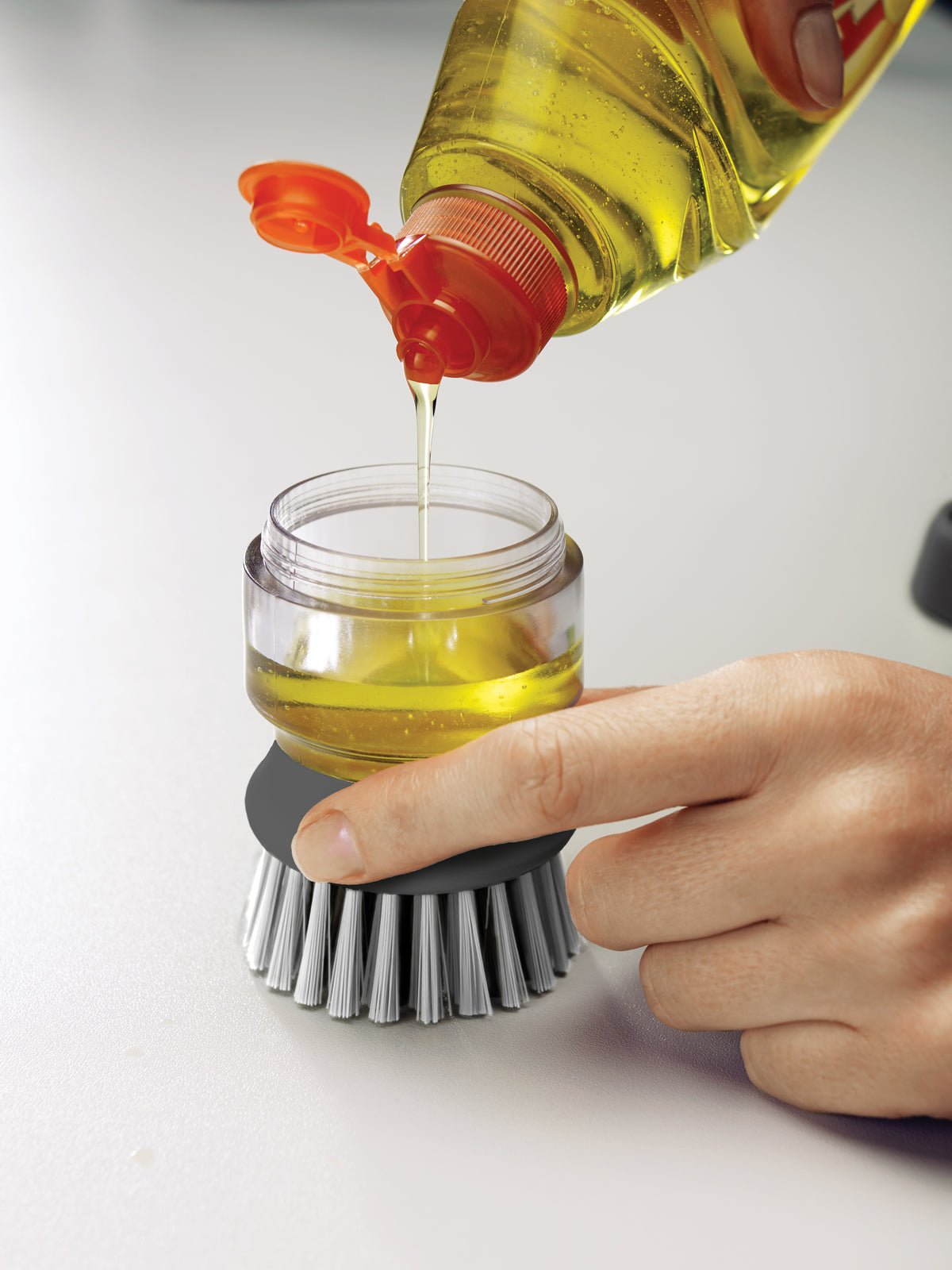 Joseph Joseph Palm Scrub Soap Dispensing Washing-Up Brush With Storage  Stand - Grey